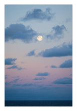 Load image into Gallery viewer, A luminous full moon rises above a tranquil ocean at sunset, while layered clouds add depth to the glowing sky and golden reflections shimmer across the gentle waves, creating a serene and timeless south coast landscape bermagui nsw 