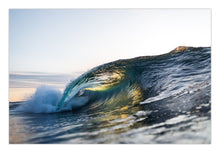 Load image into Gallery viewer, Ebrise – hollow wave barrel pitching over with golden morning sunrise light catching the interior of the curl, warm teal and amber tones, shot from water level, South Coast, Sapphire Coast, coastal decor photography by Greg Selby