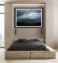 Load image into Gallery viewer, Etior fine art print — dark storm clouds and a single shaft of light over the Australian coast. Greg Selby Photography