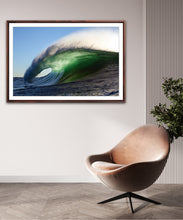Load image into Gallery viewer, Aurin – massive green barrel wave with tunnel wide open, golden morning light on the face and spray off the lip against a clear blue sky, Australian coastline, fine art photography by Greg Selby

