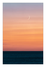 Load image into Gallery viewer, Original artwork of a crescent moon rising above the ocean at Bermagui, with soft peach and pink sunset skies and a calm seaby Artist Greg Selby available for printed decor