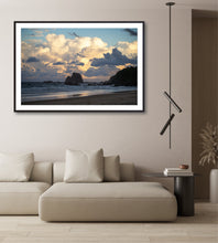 Load image into Gallery viewer, Beige sofa in a living room with a framed beach scene on the wall. Glasshouse narooma south coast greg selby print