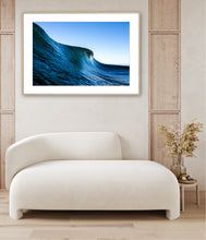Load image into Gallery viewer, Tudor – tall dark navy-green wave face almost vertical against a bright midday pale blue sky, water streaming down the face, shot from water level, South Coast, Sapphire Coast, fine art photography by Greg Selby