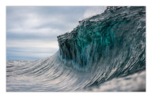 Load image into Gallery viewer, Inault — a towering teal ocean wave at peak power, glassy face and sharp edge against a moody sky. Fine art print by Greg Selby.