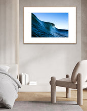 Load image into Gallery viewer, Tudor – tall dark navy-green wave face almost vertical against a bright midday pale blue sky, water streaming down the face, shot from water level, South Coast, Sapphire Coast, fine art photography by Greg Selby