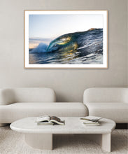 Load image into Gallery viewer, Ebrise – hollow wave barrel pitching over with golden morning sunrise light catching the interior of the curl, warm teal and amber tones, shot from water level, South Coast, Sapphire Coast, coastal decor photography by Greg Selby