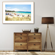 Load image into Gallery viewer, A vibrant beach scene with clear blue skies, featuring people sunbathing, playing, and walking on the beach with the ocean in the background.
Sunny beach landscape with turquoise ocean, golden sand, beach umbrellas, and people enjoying a relaxing summer day.
Bermagui Far south coast Greg Selby photography Horseshoe bay NSW