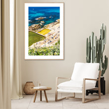 Load image into Gallery viewer, Bermagui Blue Pool original artwork featuring turquoise ocean waters, vibrant blue pool tones, and contrasting yellow and green Australian coastal colours.